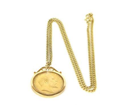 A 1908 sovereign, channel set to a 9ct gold pendant mount suspended on gold chain (tested as approximately 9ct gold), 14.56g