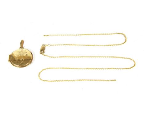 An Italian 9ct gold circular hinge locket, with engraved floral design, suspended on a 9ct gold belcher link chain, damaged ,