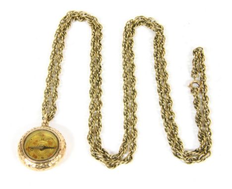 A circular compass in a planished case, suspended on a Prince of Wales chain, fob stamped 9ct., chain tested as 9ct gold, 19.