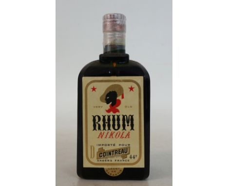 RHUM NIKOLA CIRCA 1920'S
An exclusive chance to get hold of this superb bottle of Rhum Nikola imported for Cointreau circa 19