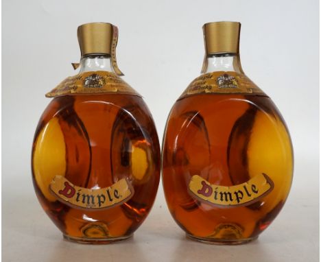 2 HAIG'S DIMPLE circa 1970'S
Haig's Dimple Blended Scotch Whisky.  26 2/3 Fl. Ozs.  70 degree proof.  Bothe bottles missing w