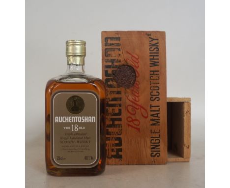 AUCHENTOSHAN 18 YEAR OLD
An older bottling of Auchentoshan Single Malt Scotch Whisky presented in original wooden case.  75cl
