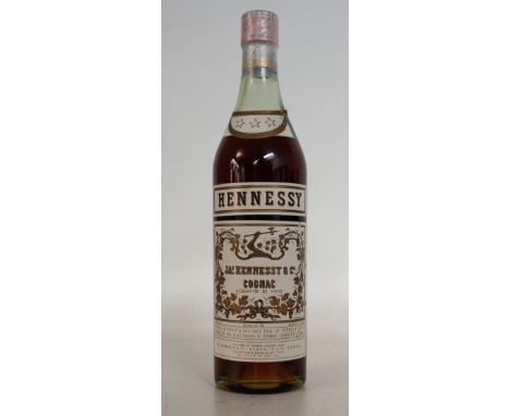 HENNESSY BRAS ARME COGNAC CIRCA LATE 1940'S
A rare bottling of Hennessy Cognac from mid-late 1940's.  73cl.  40 degrees.  Imp