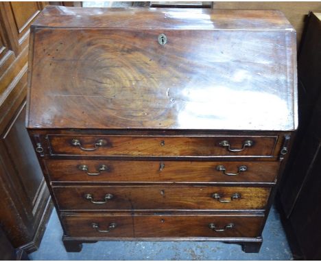A Georgian mahogany bureau with fitted interior over four long graduated drawers on shaped bracket feet, 93 x 48 x 104 cm hig