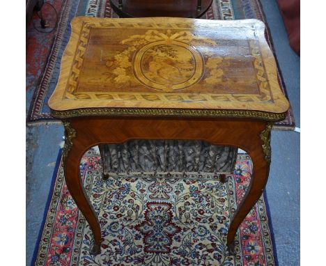 A fine quality ormolu mounted marquetry yew -wood work table, 19th century, in the manner of the cabinet maker/retailer E H B