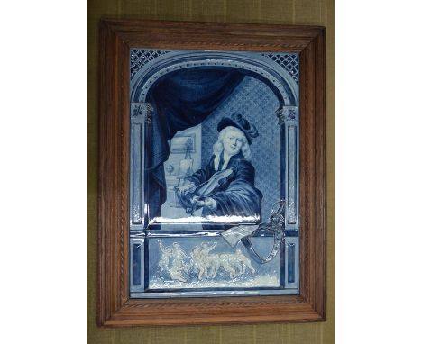 A 19th century Continental delft plaque painted and embossed with portrait of a 17th century violinist after Gerard Dou, a fr