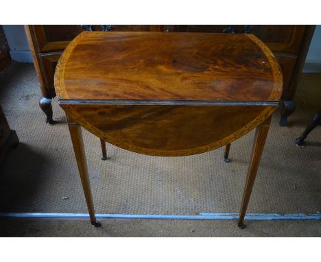 A George III cross-banded and inlaid mahogany Pembroke table, with bow front end drawer raised on slender square section legs