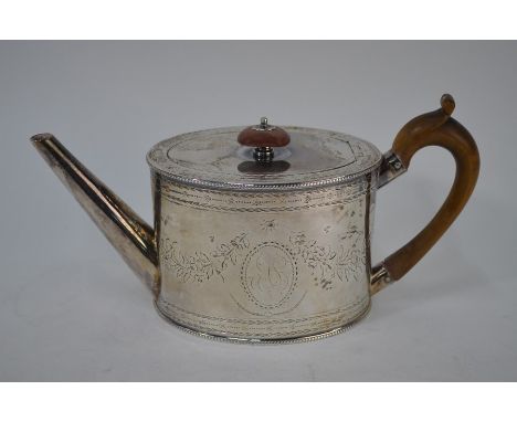 A George III oval silver teapot with straight spout, engraved decoration and wood finial and handle, (probably) John Romer, L