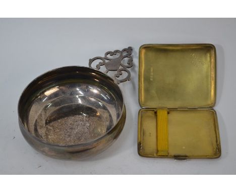 A Britannia standard silver taste-vin with pierced handle, Thomas Bradley &amp; Sons Ltd, Sheffield 1924, 10.5 cm diam to/w a