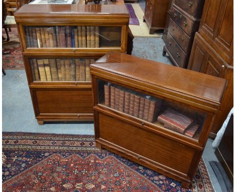 Two companion Globe Wernicke library bookcases, comprising two glazed sections on an unglazed cabinet base, and a single glaz