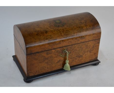 A good Victorian dome top burr walnut tea caddy, the interior with pair of hinge top canisters with gilt-metal armorials flan