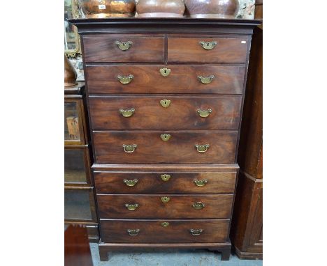 A Georgian chest on chest, with two short over six long drawers, raised on shaped bracket feet, 105 cm x x 55 x 175 cm high