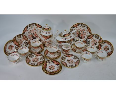 A Royal Crown Derby china 'Derby Japan' tea/coffee service, comprising tea and coffee pots, milk jug, two sandwich plates, ei