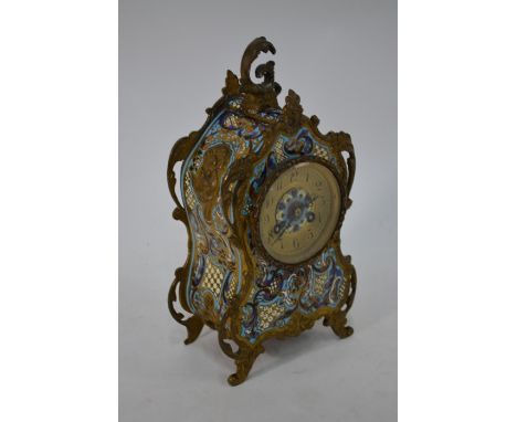 A 19th century French Rococo Revival champlevée enamel mantle clock, the Vincent et Cie drum movement striking on a bell, dat
