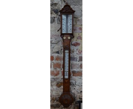 A Victorian oak stick barometer with white ceramic registers, 103 cm h