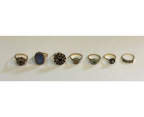 A collection of rings including oval opal doublet set 9ct yellow gold, sapphire and diamond cluster ring set 18ct yellow gold