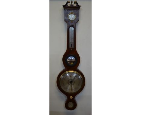 A Victorian mahogany wheel barometer, with engraved silvered dial, subsidiary dry/wet, thermometer, level and small convex mi