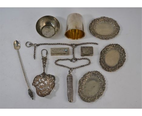 A French 950 grade small beaker with gilt interior and foliate engraving, to/w an ornately pierced Sterling cabinet spoon, th