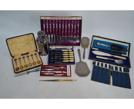 A cased set of six silver Masonic teaspoons with gilt bowls and enamel finials, Timperley Lodge Ladies Festival 1925-30, t/w 