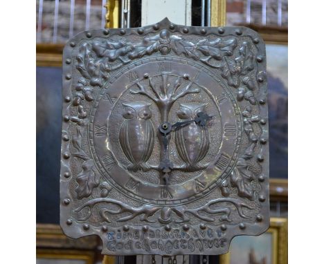 A Glasgow School Arts &amp; Crafts wall clock, the embossed square dial with two owls over a text 'Time passes ...... ' with 