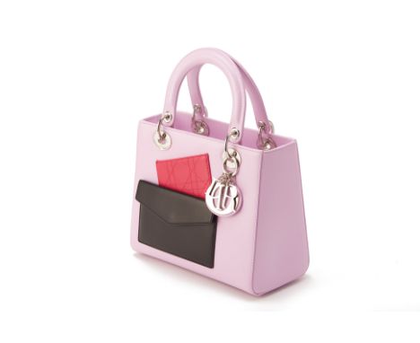 From a private Singaporean collection
Lilac with black and red contrast pockets leather Medium Lady Dior, with Dior dust bag,