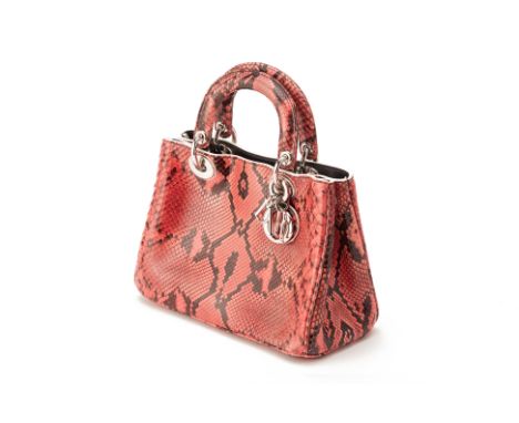 From a private Singaporean collection
Pink and black snake skin, with authenticity card, detachable shoulder strap and design