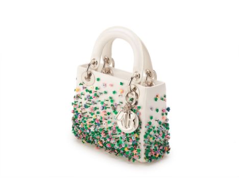From a private Singaporean collection
Flower embellished white satin Mini Lady Dior, with Dior dust bag, authenticity card, d