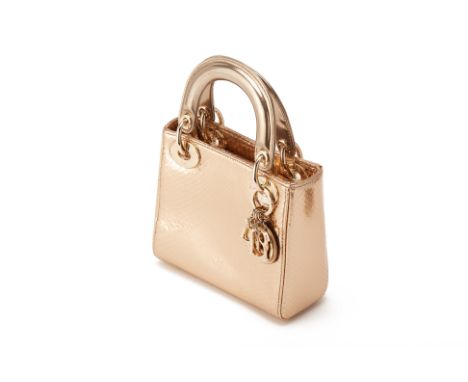 From a private Singaporean collection
Gold python skin Mini Lady Dior, with Dior dust bag, authenticity card, detachable shou
