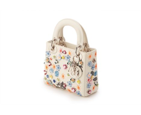 From a private Singaporean collection
Flower embellished white leather Mini Lady Dior, with Dior dust bag, authenticity card,