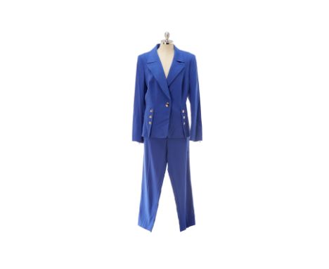 From a private Singaporean collection
Blue 'heather' trouser &amp; jacket suit, with gold button detailing and stitch detaili