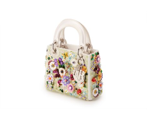 From a private Singaporean collection
Flower embellished white satin Mini Lady Dior, with authenticity card, detachable shoul