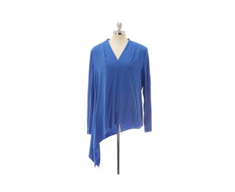 From a private Singaporean collection
'Nikka' Blue heather blouse, can be worn with a longer hem on one side or tied for a mo