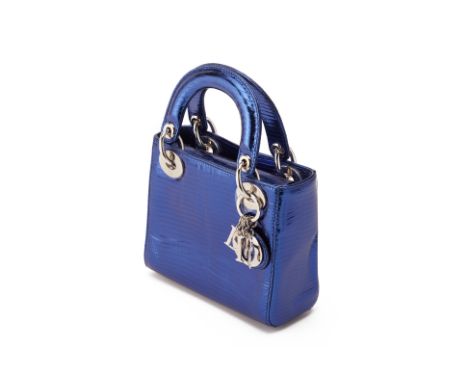 From a private Singaporean collection
Metallic blue lizard skin Mini Lady Dior, with Dior dust bag, authenticity card, detach