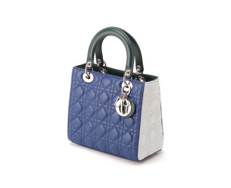 From a private Singaporean collection
Quilted blue with pale grey sides and dark green handles leather Medium Lady Dior, with