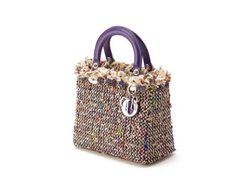 From a private Singaporean collection
Black tweed wool and leather Medium Lady Dior, with purple handles with Dior dust bag, 