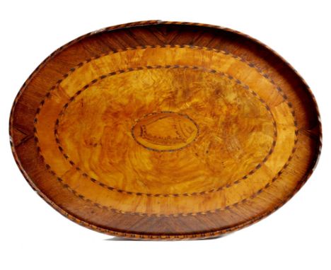 λ An early 19th century rosewood and satinwood oval drinks tray, with an inlaid gallery and a banded centre with feather stri
