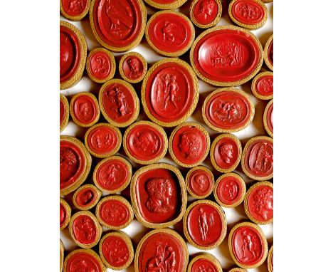 A large collection of early 19th century Grand Tour wax seal intaglios and cameos, of classical scenes, portrait busts and ot