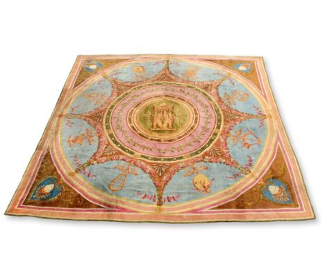 A 19th century French Savonnerie Empire style carpet, with a central fan medallion decorated with laurel leaves and with a cl