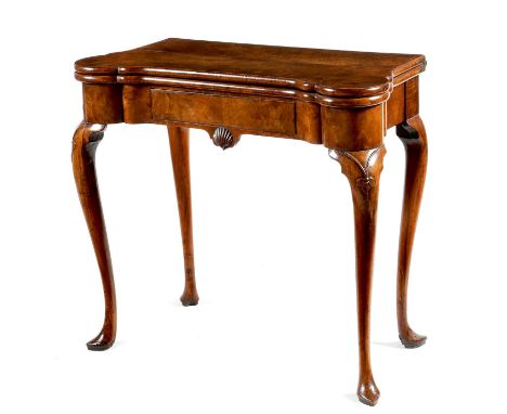 A George II walnut concertina action card table, the hinged fold-over top with protruding front corners, revealing a baize li