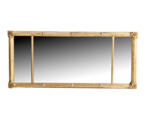 An early 19th century giltwood overmantel mirror, with three later rectangular plates, within a cluster column frame, 54.2cm 