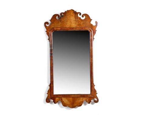 A George II walnut fret-frame wall mirror, the later bevelled plate within a moulded frame and with scroll decoration, 92 x 4