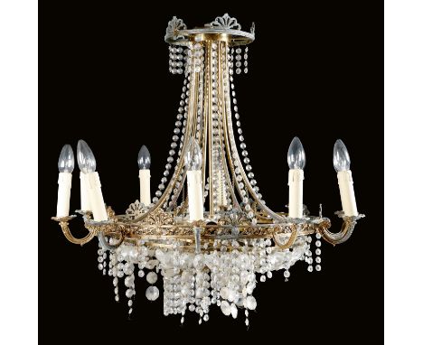 A Regency style gilt brass seventeen-light basket chandelier, decorated with palmettes and hung with cut glass drops, 71.4cm 