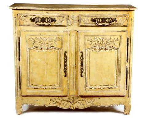 An early 19th century French provincial cherrywood  buffet, later painted, with a pair of frieze drawers with steel handles, 