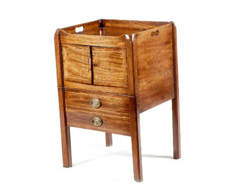 A George III mahogany tray-top bedside commode, inlaid with stringing, the gallery pierced with two handgrips, above a cupboa
