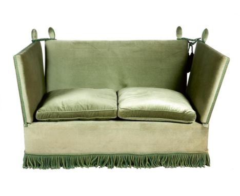 A Knole sofa by Kingcome, upholstered with green plush fabric, on castors, modern, 107cm high, 170.3cm wide, 94.5cm deep. Pro