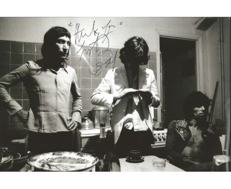 Rolling Stones Charlie Watts signed 12 x 8 inch b/w relaxed band photo in kitchen. Good Condition. All autographed items are 