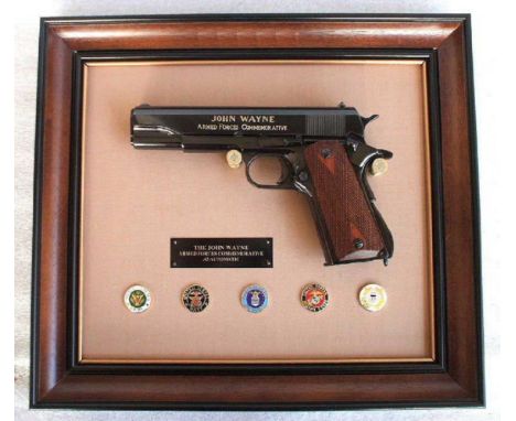 John Wayne Commemorative REPLICA Armed Forces M1911.45 Automatic. An exact replica of the M1911A Colt 45 Automatic John Wayne