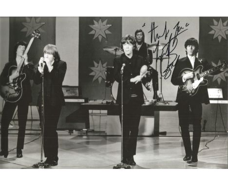 Rolling Stones Charlie Watts signed 12 x 8 inch b/w relaxed band photo. Good Condition. All autographed items are genuine han