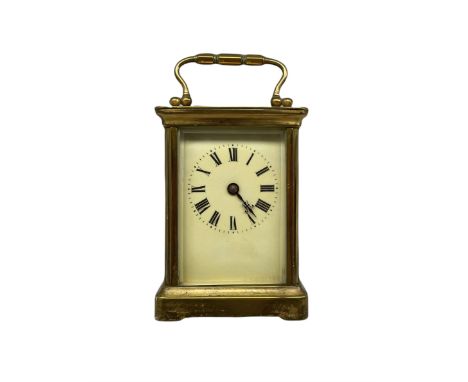 An early 20th century French corniche carriage clock with an eight-day timepiece movement, jewelled lever platform escapement
