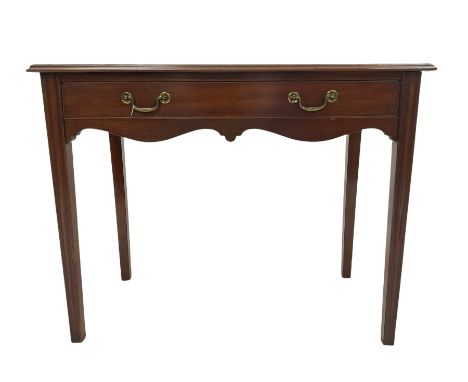 Georgian style mahogany console table, the rectangular top over one drawer and shaped apron, raised on square tapered support